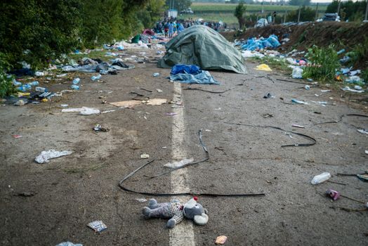 SERBIA, Berkasovo: Middle Eastern refugees leave a makeshift camp in the Serbian town of Berkasovo, on the border with Croatia on September 24, 2015. 