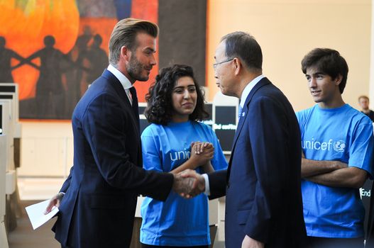 UNITED STATES, New York: David Beckham (l) and Ban Ki-moon shake hands as they (r) call on world leaders to focus on improving the lives of children in New York on September 24, 2015. Speaking at a Giving Youth a Voice event, Beckham, a goodwill ambassador for Unicef, said children's voices are not being heard. 