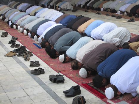 PAKISTAN, Peshawar: Muslims celebrate Eid-al-Adha by offering prayers at a mosque in Peshawar, Pakistan on September 25, 2015. The festival marks the end of Hajj, which is a holy pilgrimage that many Muslims make every year.  	