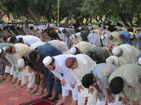 PAKISTAN, Peshawar: Muslims celebrate Eid-al-Adha by offering prayers at a mosque in Peshawar, Pakistan on September 25, 2015. The festival marks the end of Hajj, which is a holy pilgrimage that many Muslims make every year.  	