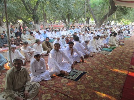 PAKISTAN, Peshawar: Muslims celebrate Eid-al-Adha by offering prayers at a mosque in Peshawar, Pakistan on September 25, 2015. The festival marks the end of Hajj, which is a holy pilgrimage that many Muslims make every year.  	