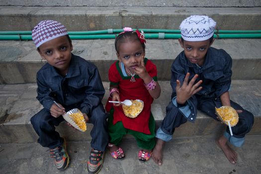 NEPAL, Kathmandu: Muslim children gesture at the camera during celebrations for Eid-al-Adha at a Kasmere Jama mosque in Kathmandu, Nepal on September 25, 2015. The festival marks the end of Hajj, which is a holy pilgrimage that many Muslims make every year. People of Islamic faith have felt more comfortable celebrating Eid ul-Adha in Nepal after the country ushered in a new democratic, secularist constitution