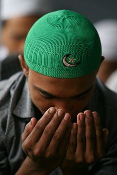 NEPAL, Kathmandu: A Muslim worshipper celebrates Eid-al-Adha by offering prayers at a Kasmere Jama mosque in Kathmandu in Nepal on September 25, 2015. The festival marks the end of Hajj, which is a holy pilgrimage that many Muslims make every year. People of Islamic faith have felt more comfortable celebrating Eid ul-Adha in Nepal after the country ushered in a new democratic, secularist constitution