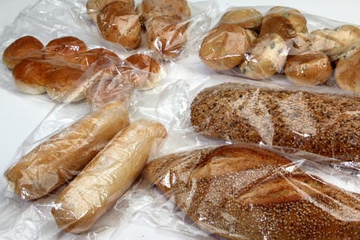 bread and cookies stored in cellophane bags for food