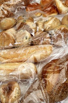 bread and cookies stored in cellophane bags for food