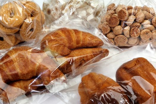 biscuits, pastries, nougat and macaroons preserved in cellophane bags for food