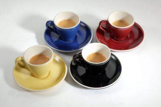 4 espresso cups in colored