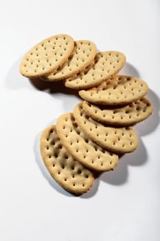 group of crackers in a semicircle on a white background