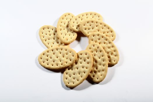 group of crackers shaped like a flower on a white background