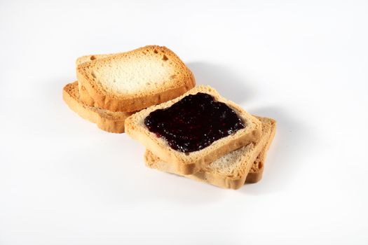 biscuits with jam on white background