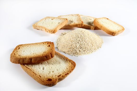 bread crumbs with biscuits on white background