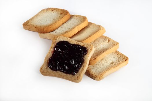 group biscuits with jam on white background