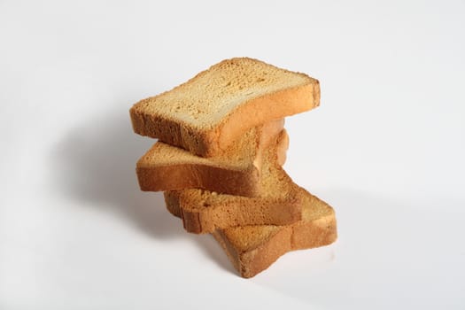 four slices toast viewed from above on a white background