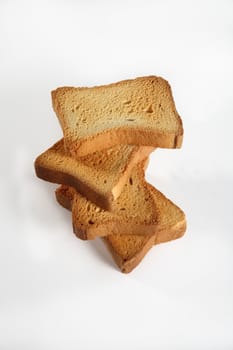 four slices toast viewed from above on a white background