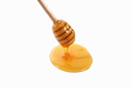 sprinkle honey on white background