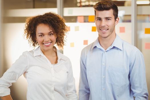 Portrait of confident business people standing in office