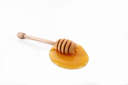 tablespoon honey on white background