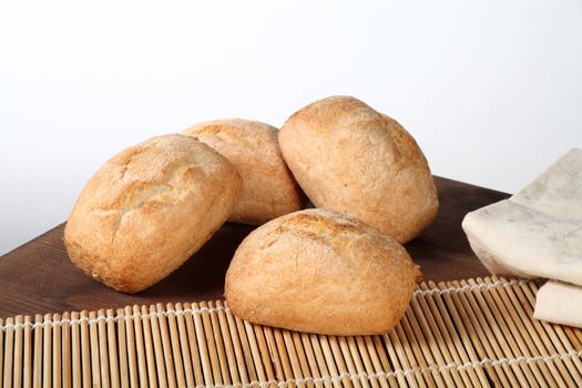 bread on wood table-white background