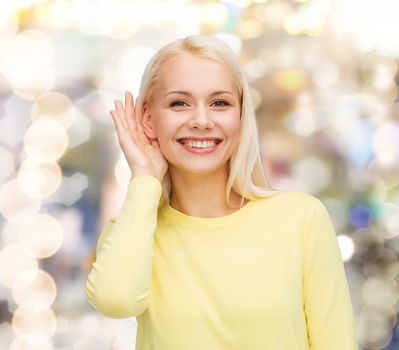 gossip, communication and people concept - smiling young woman listening to gossip