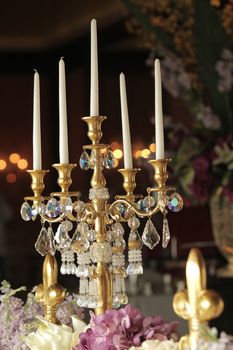 Candlesticks retro style on table with flower