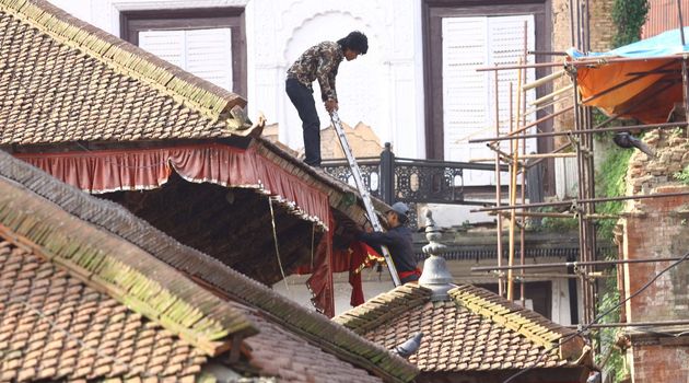 NEPAL, Kathmandu:  	The erection of a wooden Indradhoj pole in Hanumandhoka�Durbar Square on September 25, 2015 marked the beginning of Indrajatra festival in Kathmandu, Nepal.  	Indrajatra is an eight day festival with a chariot procession dedicated to Goddess Kumari, Lord Ganesh and Bhairav, as well as worshiping Indra, the king of gods. 