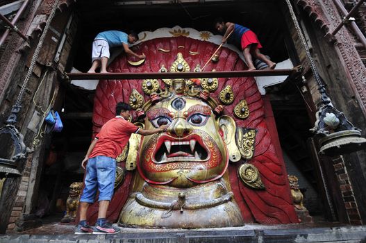 NEPAL, Kathmandu: 	The erection of a wooden�Indradhoj�pole in�Hanumandhoka�Durbar�Square on September 25, 2015 marked the beginning of�Indra�Jatra�festival in Kathmandu, Nepal.  	Indra�Jatra�is an eight day festival with a chariot procession dedicated to Goddess�Kumari, Lord�Ganesh�and�Bhairav, as well as worshiping�Indra, the king of gods. 