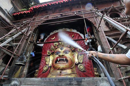 NEPAL, Kathmandu: 	The erection of a wooden�Indradhoj�pole in�Hanumandhoka�Durbar�Square on September 25, 2015 marked the beginning of�Indra�Jatra�festival in Kathmandu, Nepal.  	Indra�Jatra�is an eight day festival with a chariot procession dedicated to Goddess�Kumari, Lord�Ganesh�and�Bhairav, as well as worshiping�Indra, the king of gods. 