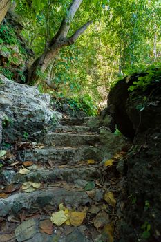 Stone staircase leading on Tembeling pool, Nusa Penida Bali Indonesia