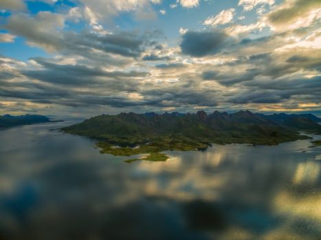 Reflecting clouds on Vesteralen islands in Norway, aerial view