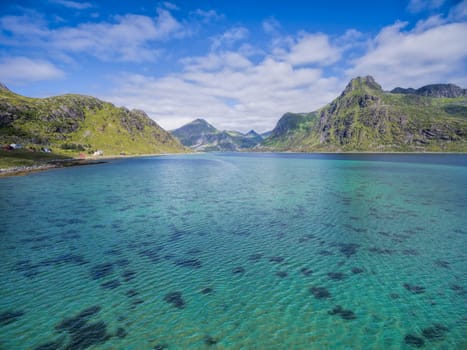 Clear waters of fjord on Lofoten islands in Norway, aerial view