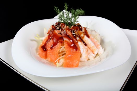 dish of Japanese cuisine meat, rice, fish and vegetables