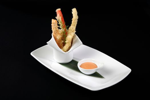 Japanese food, plate of fried fish with sauce