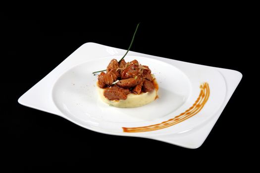 Japanese cuisine dish with stew tuna on black