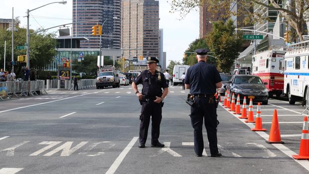 UNITED STATES, New York: Police officers stand guard near the United Nations headquarters in New York City ahead of the address by Pope Francis at the United Nations, September 25, 2015. 