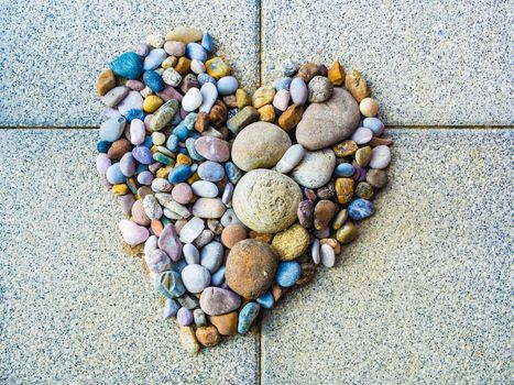 Heart made of pebbles, symbol and illustration of love romance relationship tolerance diversity religion faith hope zen relaxation mineral spa, homemade diy decoration