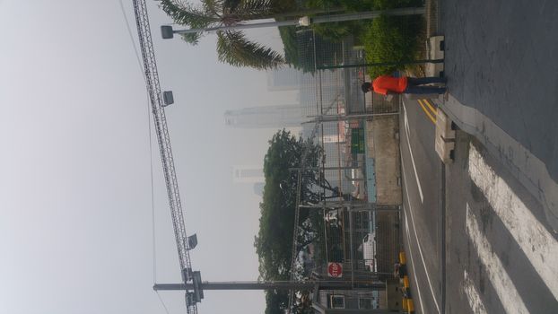 SINGAPORE: The terrible air pollution in Singapore known as the haze - caused by Indonesian forest fires and land clearances - continues on September 17, 2015, enveloping the CBD and Marina Bay. 