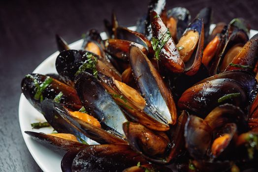 Seafood Fresh Steamed Mussels on white plate