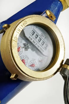 detail of water meter and industrial liquids on a white background