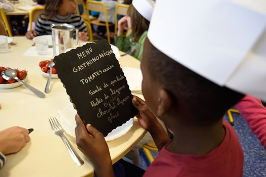 FRANCE, Valence : One Pupil looks at the exceptionnal menu he will eat at Celestin Freinet school in Valence (Dr�me), on September 25, 2015 on the occasion of French gastronomy days from September 25 to September 27, 2015. 