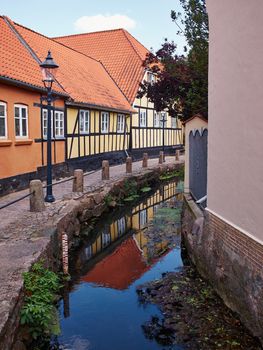 Typical small beutiful street with old traditional Danish style houses Bogense Denmark