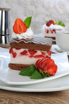 Strawberry souffle on a chocolate sponge cake 