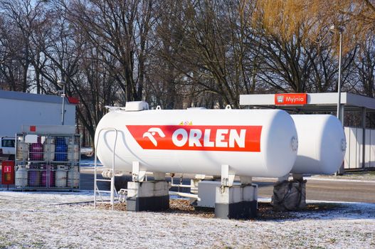 POZNAN, POLAND - JANUARY 25, 2014: Two oil tanks at a Orlen filling station on a cold winter day