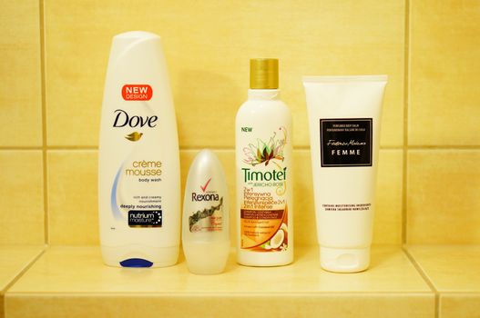 POZNAN, POLAND - JANUARY 30, 2014: Different skin care products in the bathroom