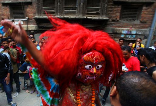 Nepal, Kathmandu: A dancer performs at the Indra Jatra celebration in Kathmandu, Nepal, on September 25, 2015. 