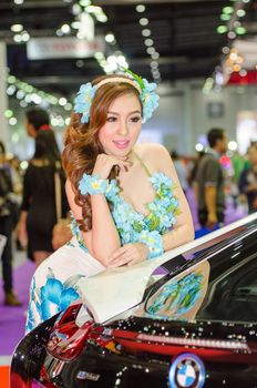 BANGKOK - AUGUST 1 : Unidentified model with BMW on display at Bangkok International Grand Motor Sale 2015 (Big Motor Sale 2015) is exhibition of vehicles for sale on August 1, 2015 in Bangkok, Thailand.