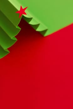 Creative design of christmas background with paper fir tree