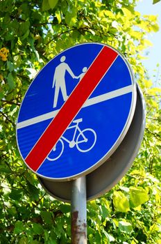 Pedestrian and bicycle sign showing end