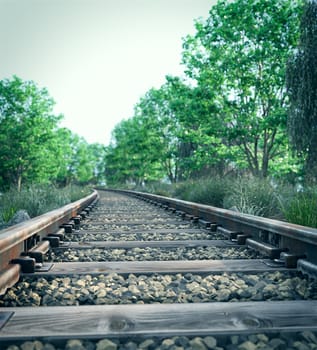 Railway track crossing rural landscape. Travel concept