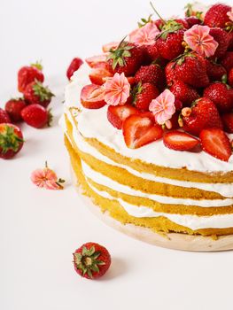 Layered, strawberry cake on the table