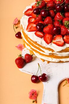 Layered, strawberry cake on the table